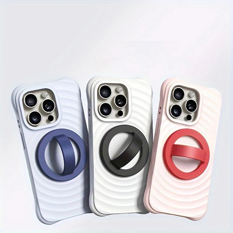 Three white silicone phone grips with colored magnetic rings shown side by side.