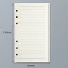 Un cuaderno de hojas sueltas blanco con líneas rayadas mostrado contra un fondo gris.