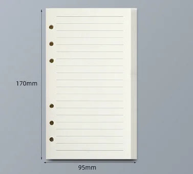 Un cuaderno de hojas sueltas blanco con líneas rayadas mostrado contra un fondo gris.