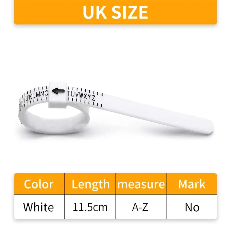 A white reusable ring sizer tool with an arrow marking, shown against a light background.