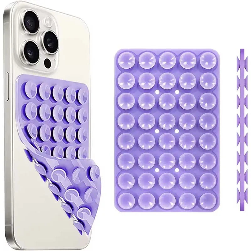 A white smartphone case and a purple silicone suction cup mount with multiple suction cups.