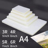 A stack of clear thermal laminating pouches in various sizes, including 5 inch, 6 inch, 7 inch, and 8 inch options.
