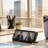 A laptop, smartphone, and charging adapter are displayed on a desk with a blurred city skyline in the background.