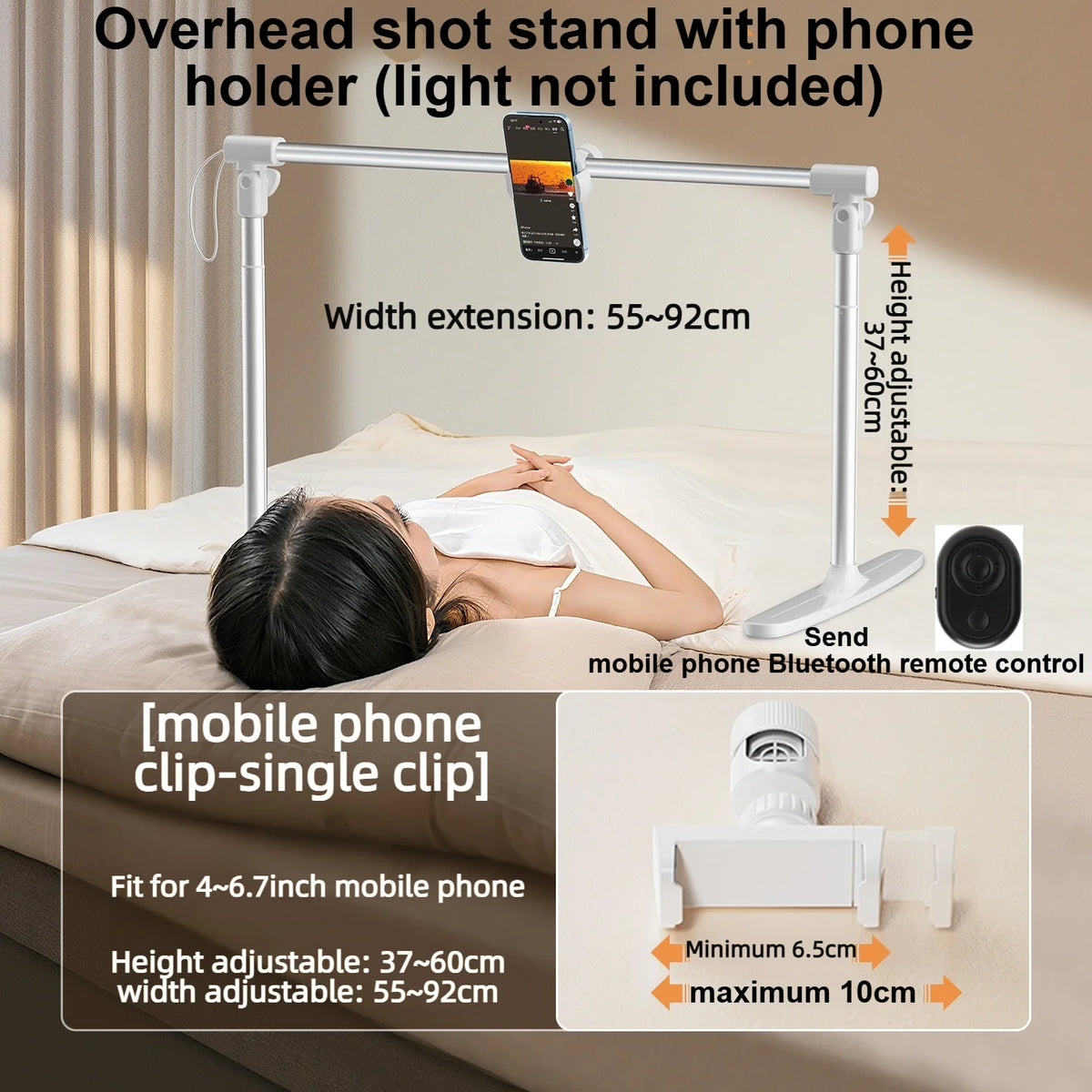Silberner Overhead-Ständer mit Telefonhalter über einer Person auf einem Bett.