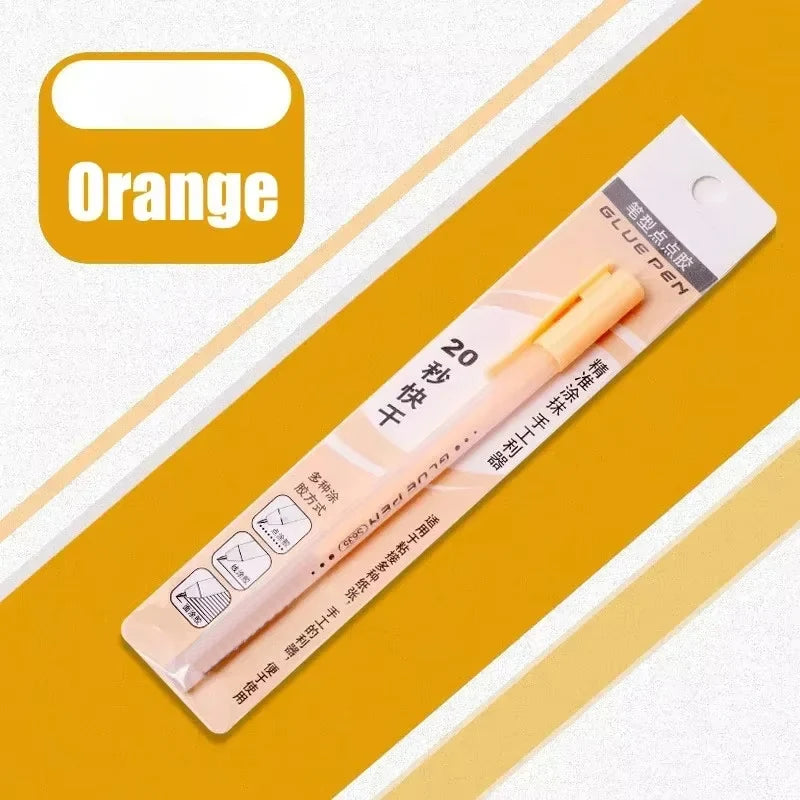 An orange glue pen is shown next to a yellow background and a white box.