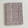 A light gray leopard print leather case designed for an iPad.