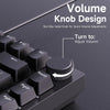 Close-up of a mechanical keyboard showing a volume knob design for quick volume adjustments