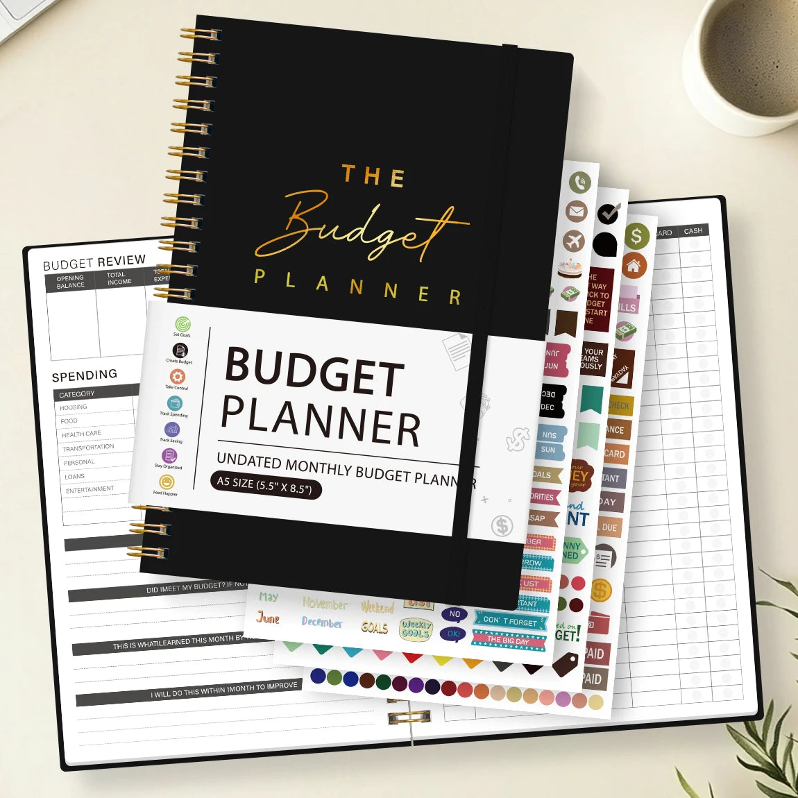 A black and white budget planner featuring a cover titled The Budget Planner and various budget tracking pages.
