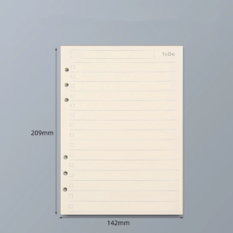 Página vertical de un cuaderno de hojas sueltas beige con encabezado de lista de tareas y líneas rayadas, sobre fondo gris.