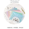 A set of four cute cartoon transparent document pouches for A4 papers in various pastel colors, displayed on a white marble s