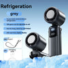 A grey handheld refrigeration fan with an ice porcelain semiconductor feature and LED display is shown against a snowy backgr