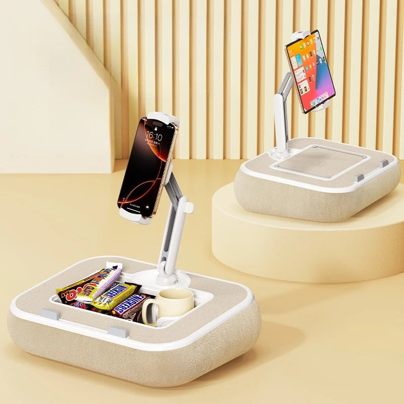 A beige phone and tablet stand with a rotating arm is shown on a light wooden surface.