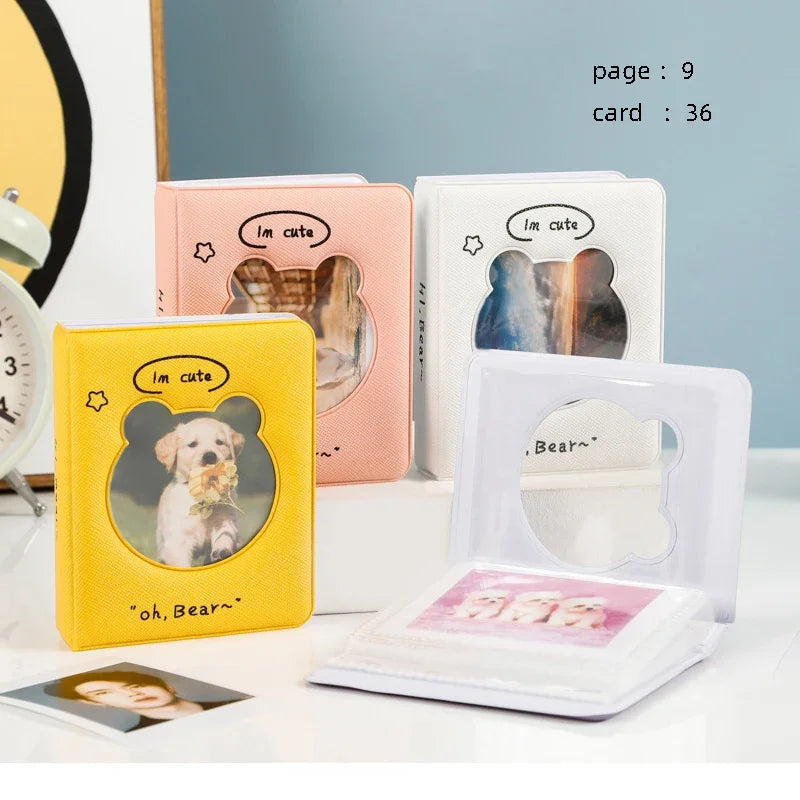 A set of pink and white hollow photo card binders featuring cute animal designs like a bear and a dog.