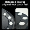 Close-up view of a black foot patch featuring white adhesive dots for balanced control.