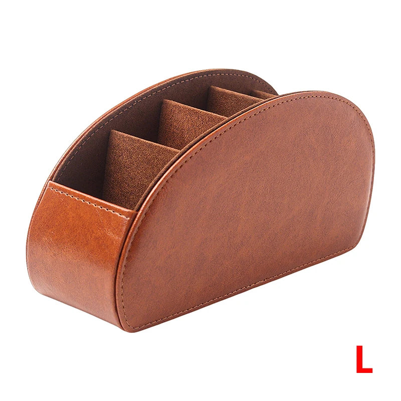 A brown PU leather caddy organizer with five compartments for storing TV remotes.