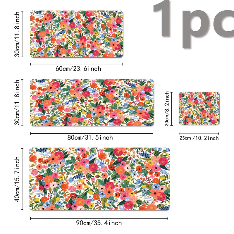 A collection of floral designs on various sized mouse pads with non-slip rubber bases.