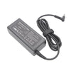 A black AC adapter for a laptop, featuring input and output specifications and a coiled cable.