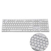 A close-up view of a white 104-key mechanical keyboard keycap set with various letter and function keys.