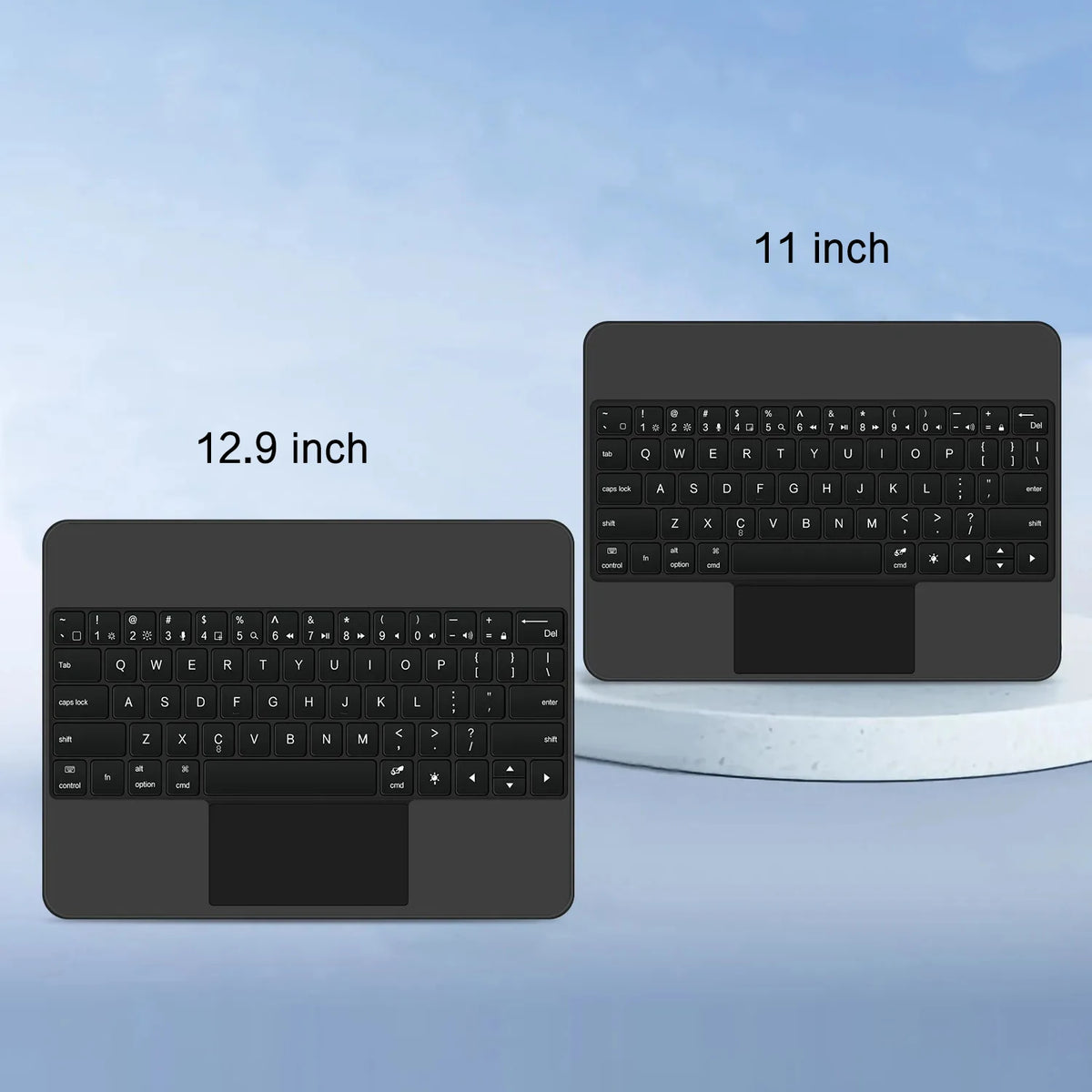 A black Magic Keyboard cover shown next to an 11 inch and 12.9 inch iPad, demonstrating its compatibility.