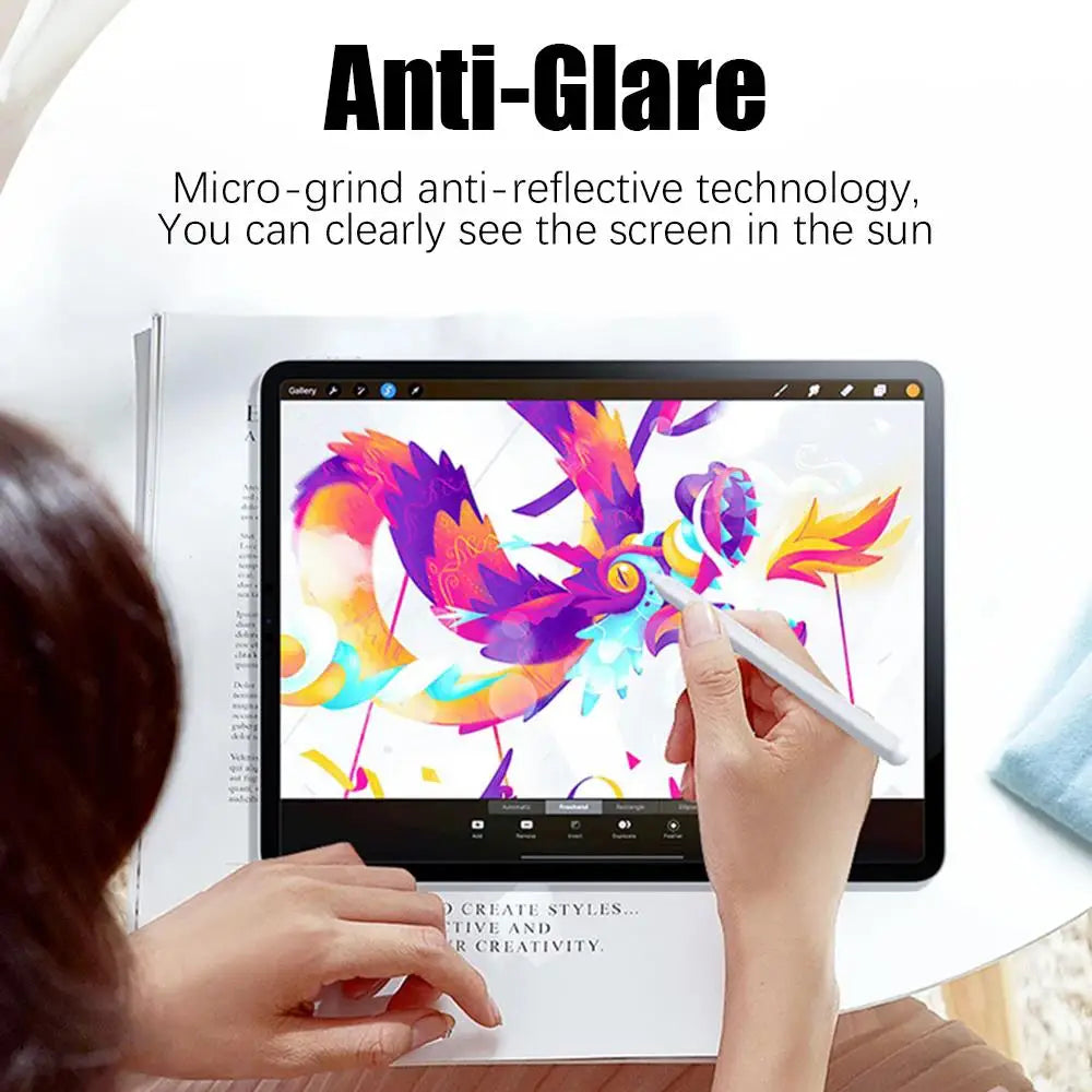 A hand is using an anti-glare screen protector on an iPad, demonstrating clear visibility in sunlight.