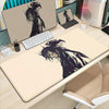 A beige gaming mousepad featuring a black silhouette of Miyamoto Musashi from the Vagabond manga.