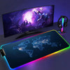 An RGB backlit gaming mouse pad featuring a glowing map of the world and an anime character design.