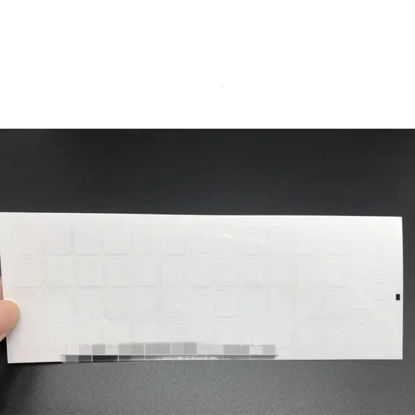 A sheet of transparent Russian keyboard stickers for laptop and desktop