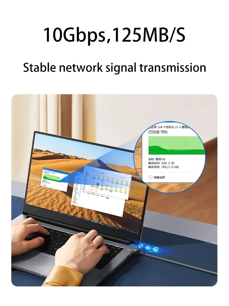 لابتوب موضح به كابل ألياف ضوئية زرقاء، يوضح نقل إشارة شبكة بسرعة 10 جيجابت في الثانية.