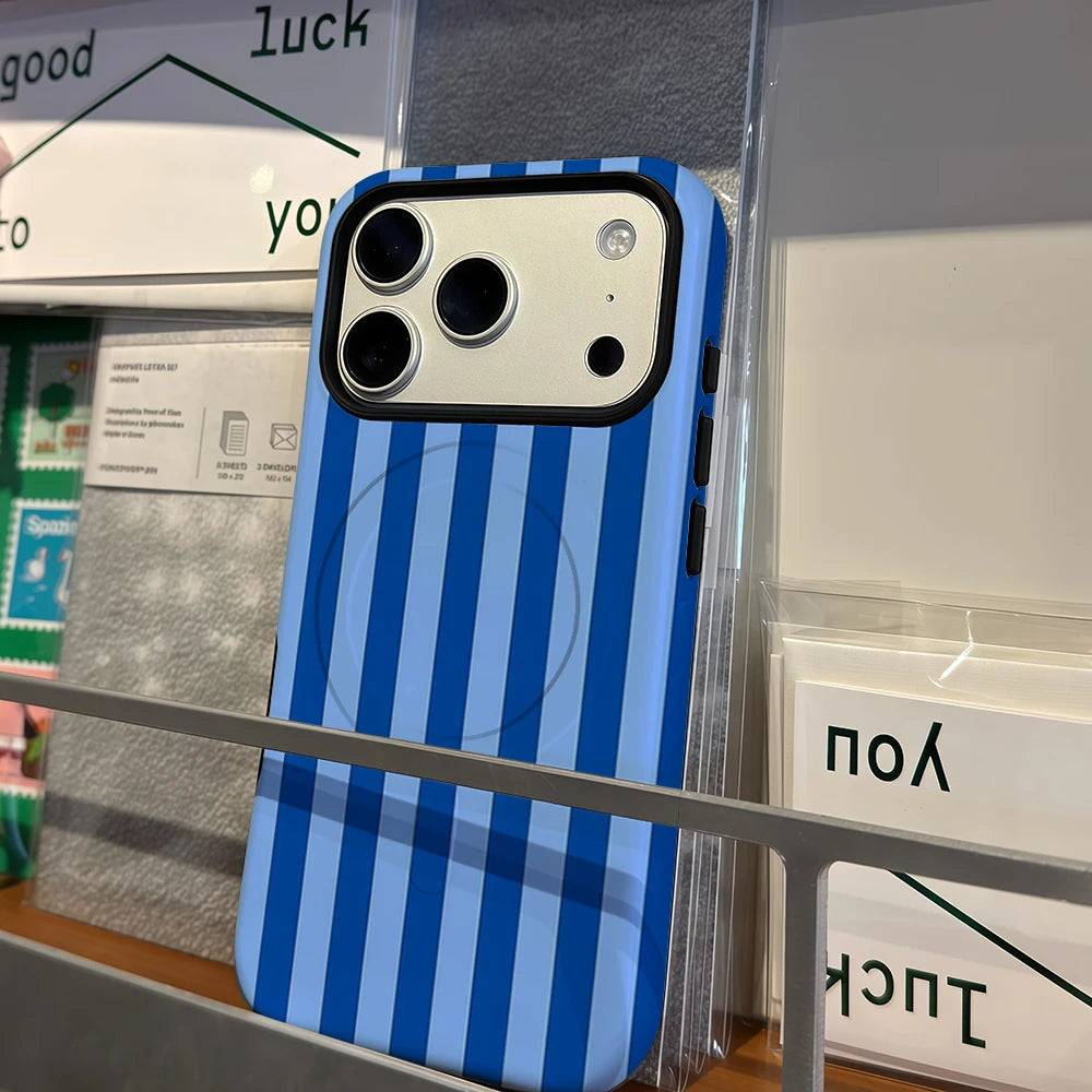 A blue and white striped phone case for an iPhone displayed in a glass case.