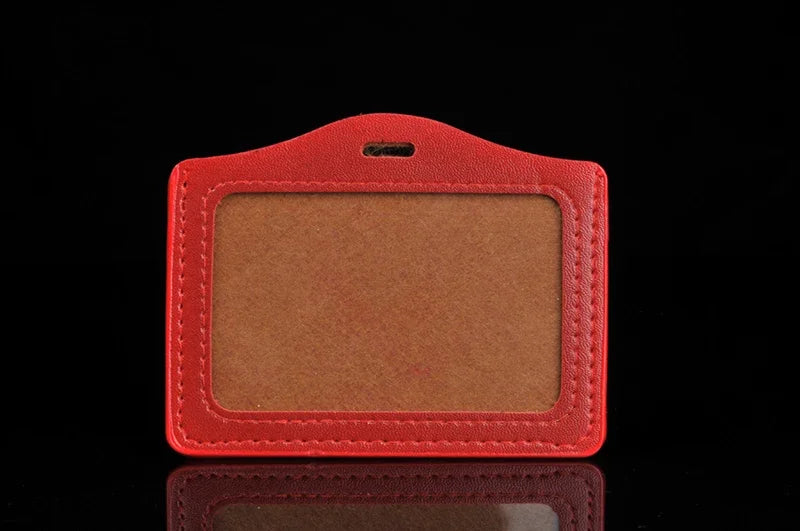 A red PU leather retractable ID card holder with a rectangular slot and a clip.