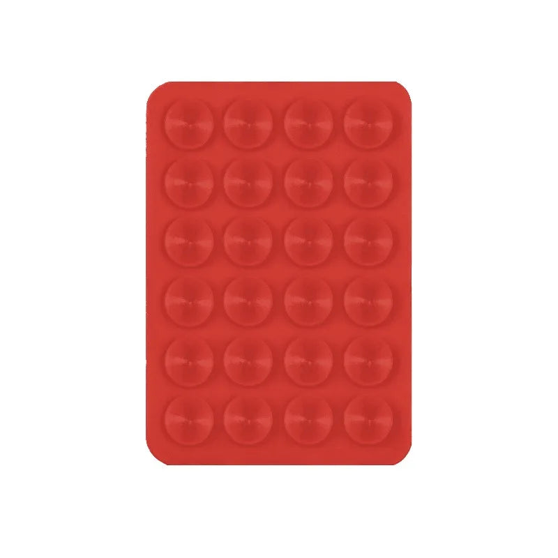 A red silicone suction cup mount product with multiple circular cups for phone and tablet mounting.