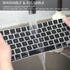 A silicone keyboard cover is being rinsed under a faucet, demonstrating its washable and reusable feature.