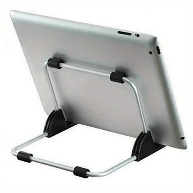 A silver foldable aluminum tablet and laptop stand with a metal frame.