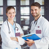 A smiling female doctor and male doctor in white lab coats holding a blue badge holder with a leopard print retractable badge