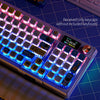Close-up of PBT sublimated shark keycaps installed on a mechanical keyboard with vibrant blue lighting.
