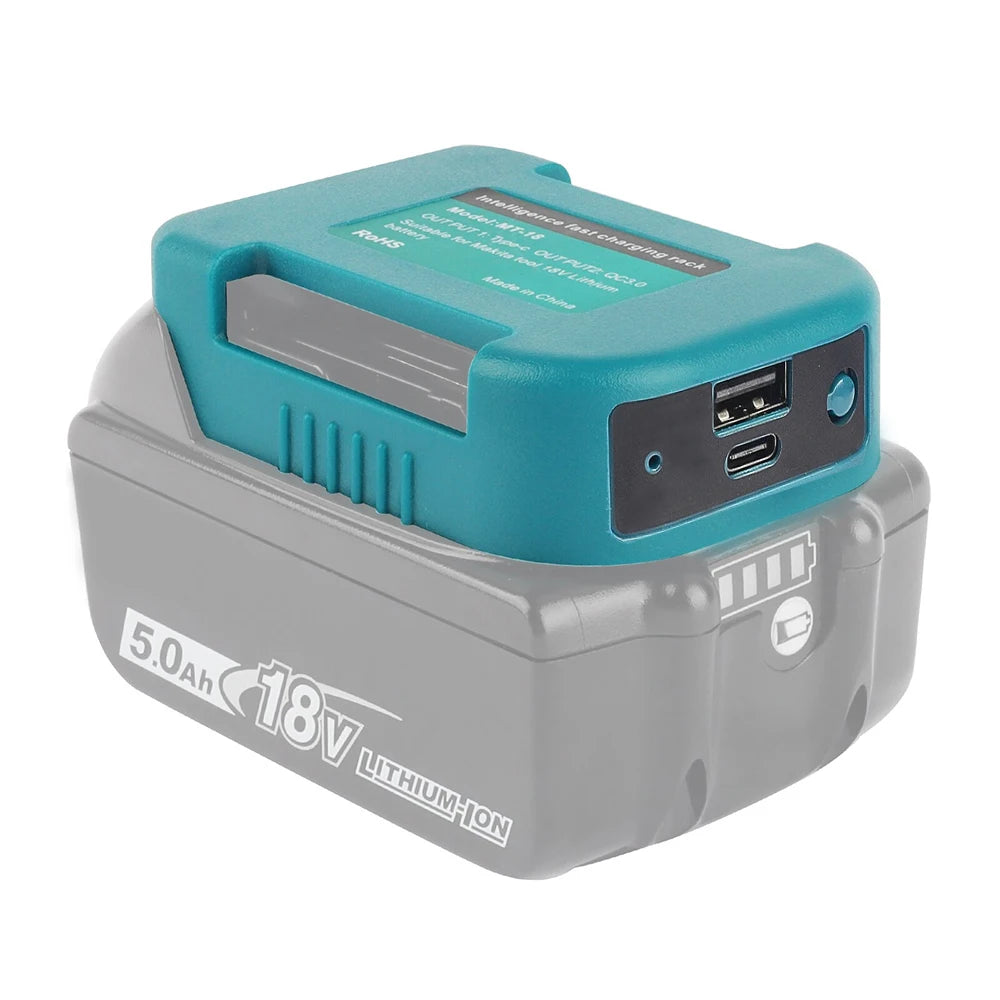 A teal and gray portable battery pack for Makita 18V tools featuring a USB and Type-C charging adapter.