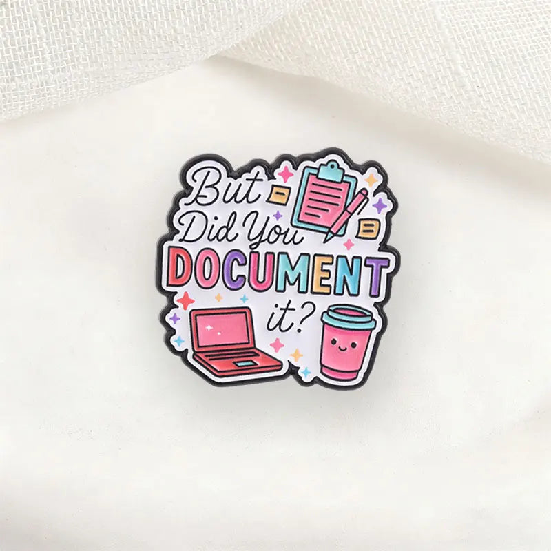 An enamel pin featuring text and icons asking But Did You Document It?