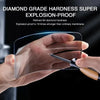 A hand is holding a clear diamond grade hardness explosion-proof screen protector over a smartphone screen.