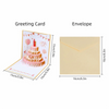 A greeting card featuring a pink birthday cake design and a festive theme next to an envelope.