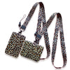 A leopard print ID holder lanyard keychain featuring a patterned fabric strap and a rectangular holder.