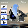 Silver wireless fast charger and suction cup holder for a car dashboard and outlet.