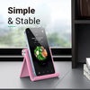 Pinkes, faltbares, mehrwinkeliges Handy-Ständer, das ein Smartphone mit einem Menü hält.