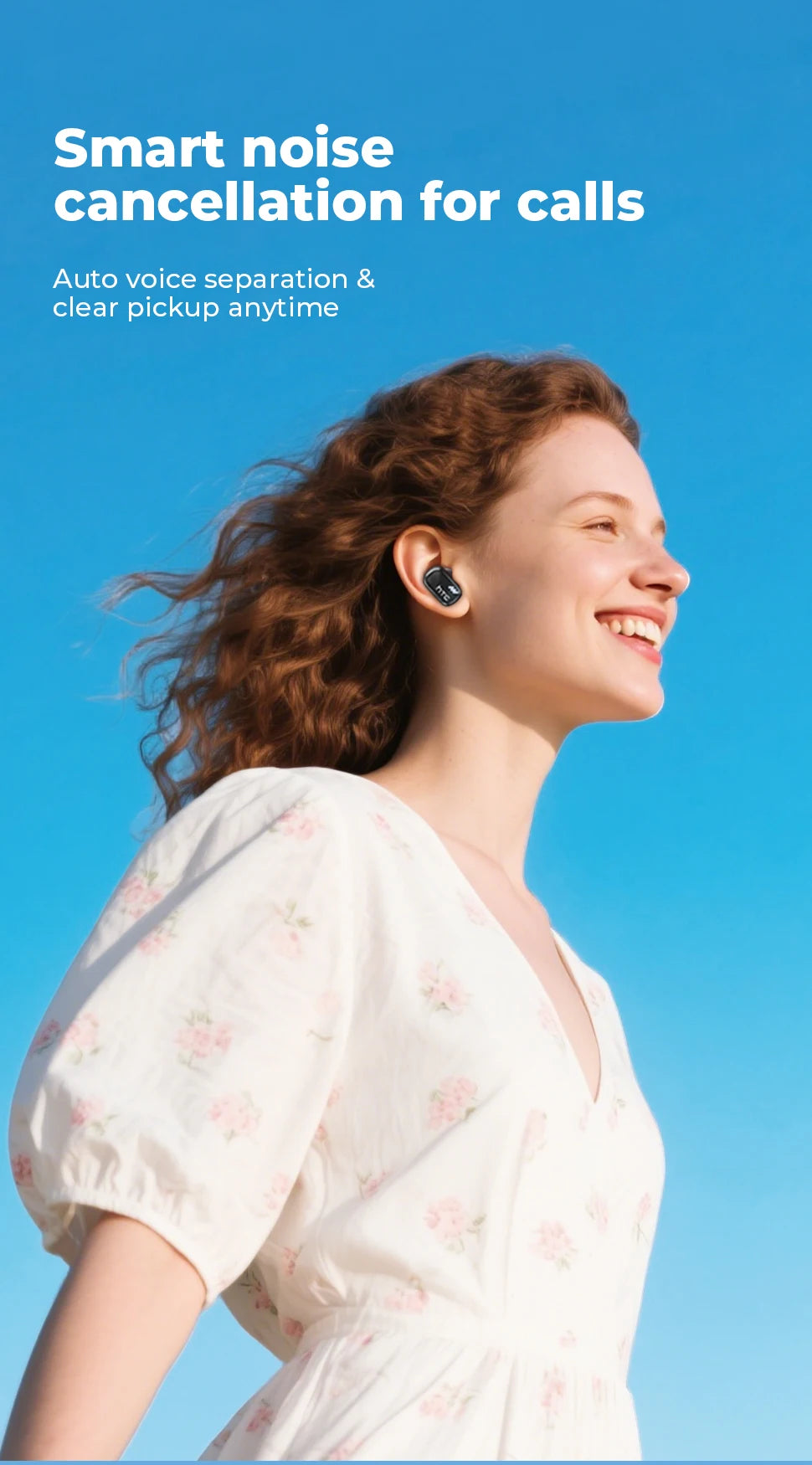 A woman smiling while wearing smart noise cancellation earbuds for calls.