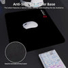 A black gaming mouse pad with a natural rubber non-slip base and a silicone wrist rest.
