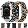 A close-up view of a black Apple Watch with a leopard print nylon band and a rose gold watch face.