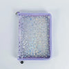 A purple A5 sticker organizer binder with clear storage pockets and a silver clasp.