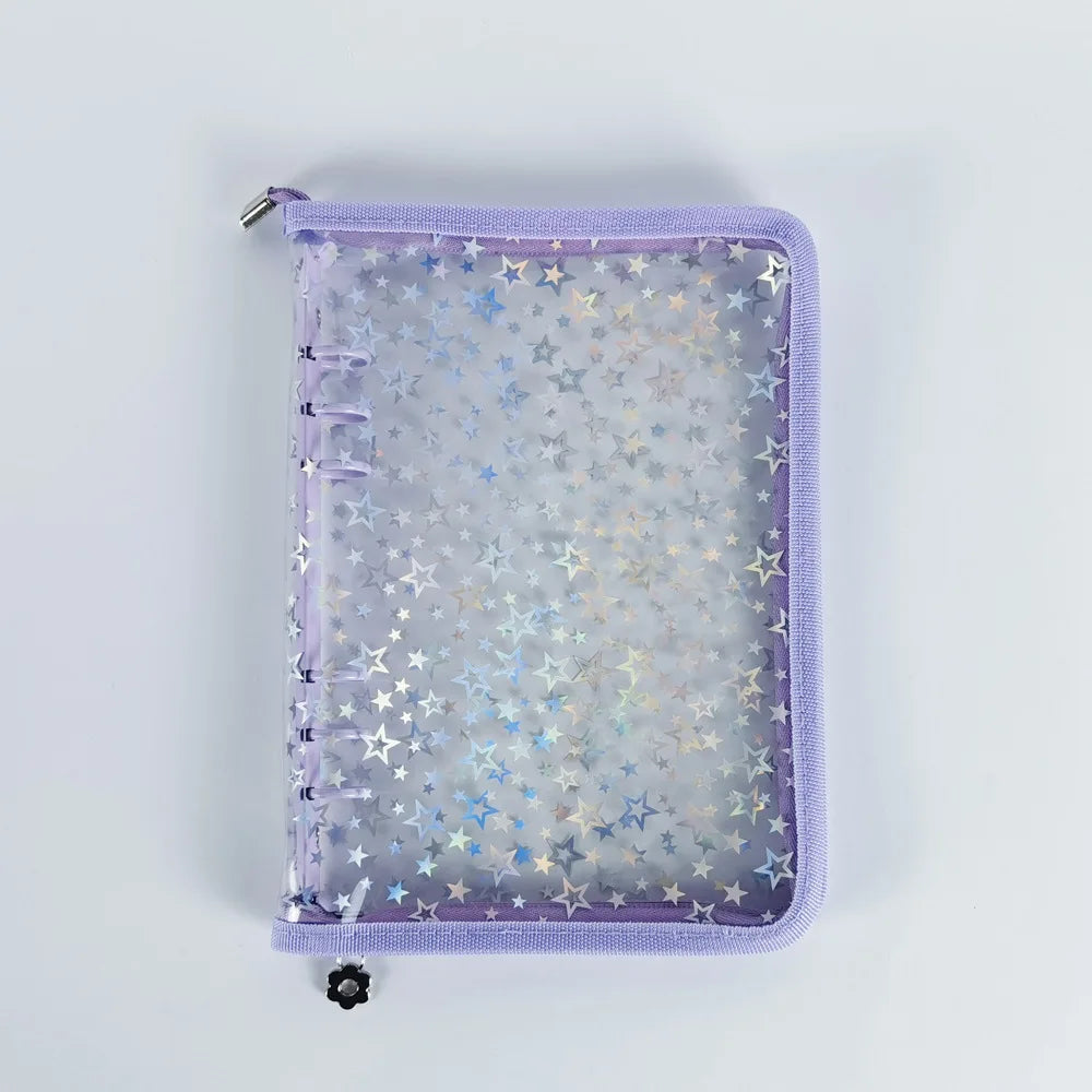 A purple A5 sticker organizer binder with clear storage pockets and a silver clasp.