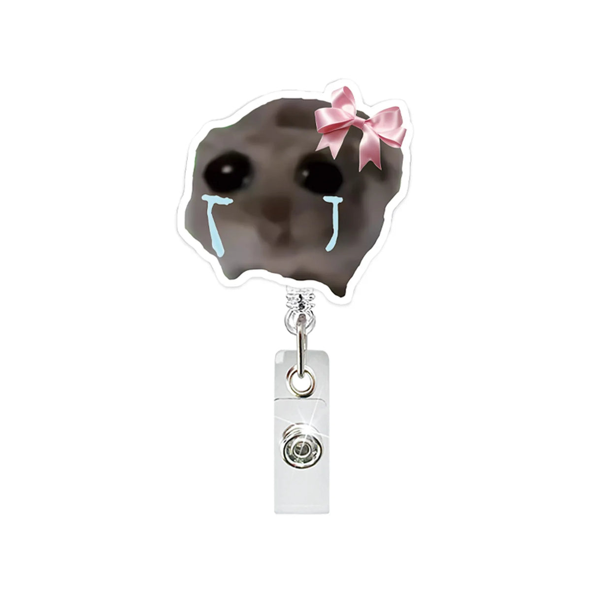 A black hamster face acrylic badge reel featuring teary eyes and a pink bow.