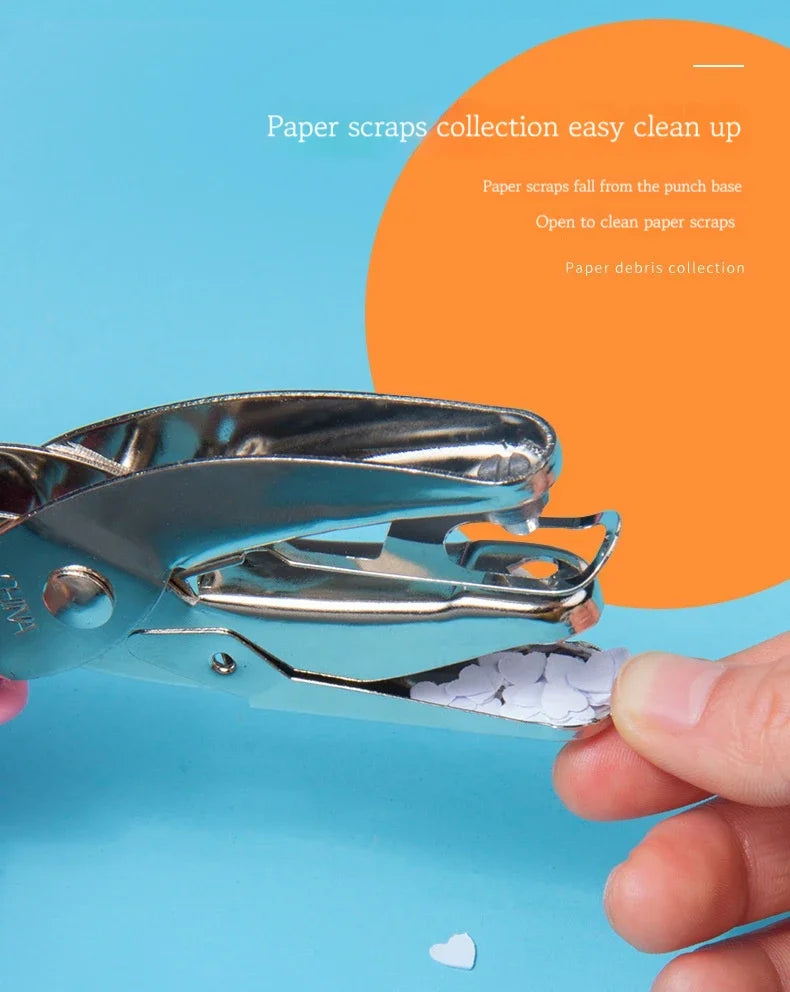 A hand holds a silver metal puncher, demonstrating how paper scraps fall from the punch base for easy cleanup.