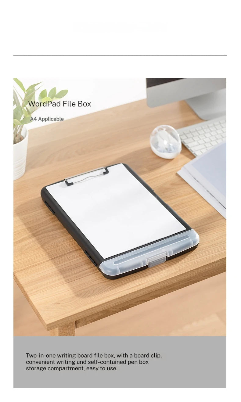 A black writing board file box with a clip and pen slot placed on a wooden desk.